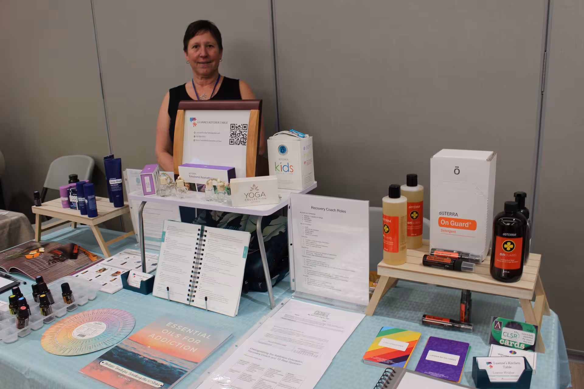 Wellness resources displayed at a WOWSA vendor table.